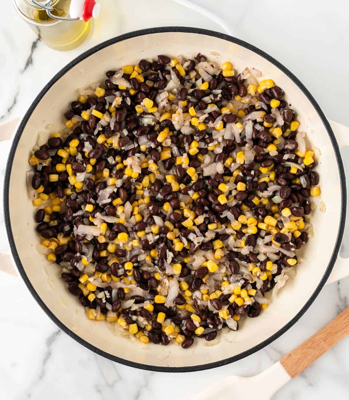 mixed black beans and corn with garlic and onion