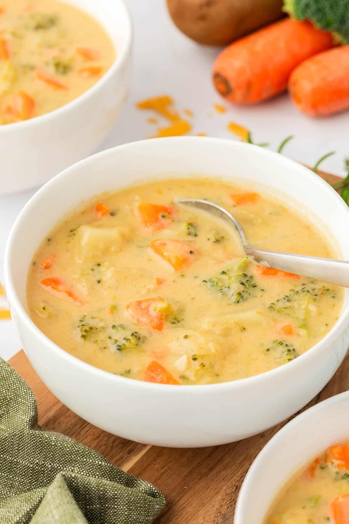 creamy vegetable soup in a bowl with a spoon