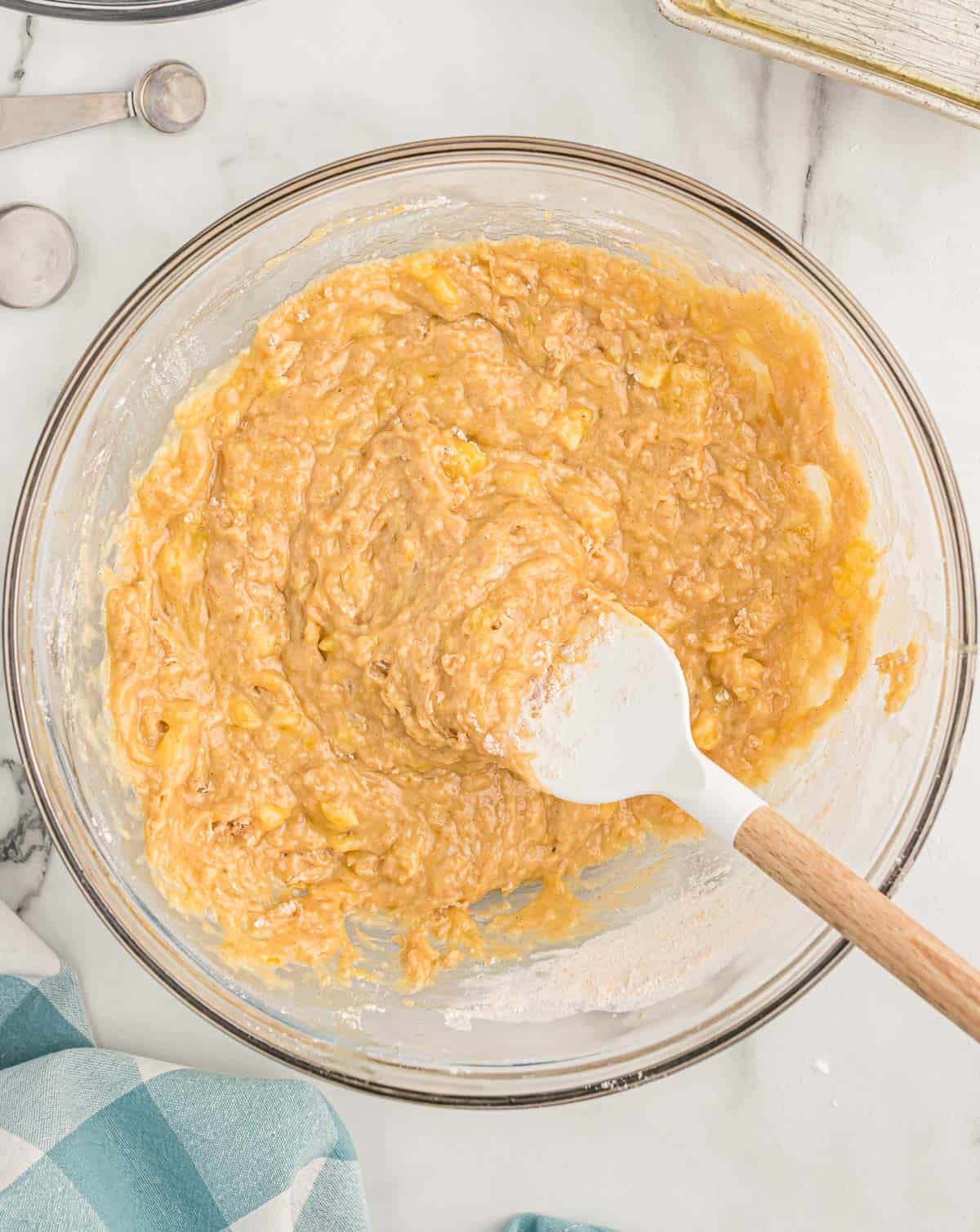 banana bread batter mixed together in a bowl