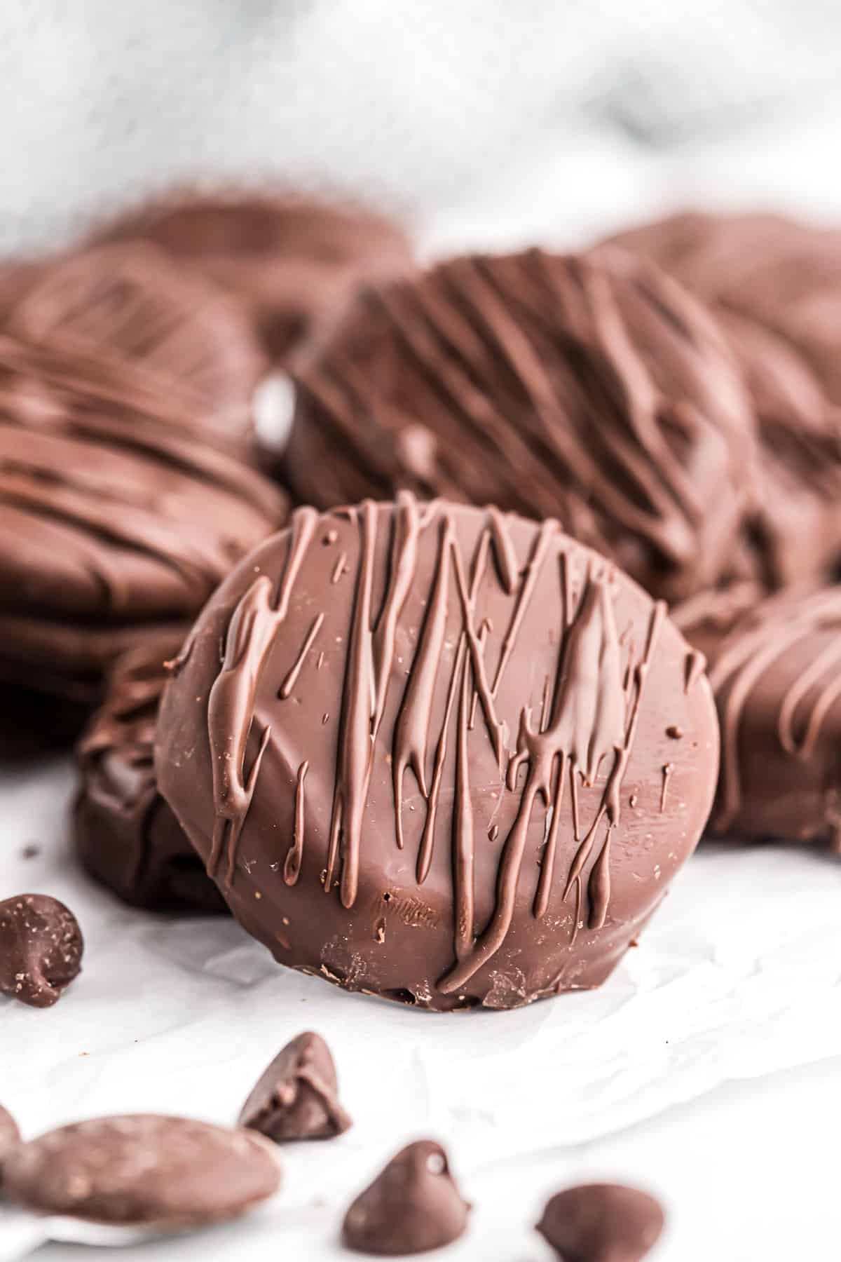 chocolate covered oreos on wax paper