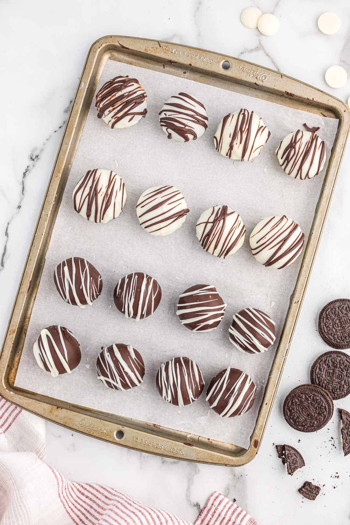 oreo balls drizzled with melted chocolate