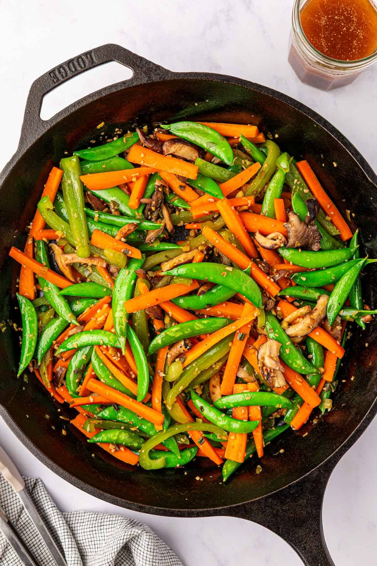 vegetables stir fried in a skillet