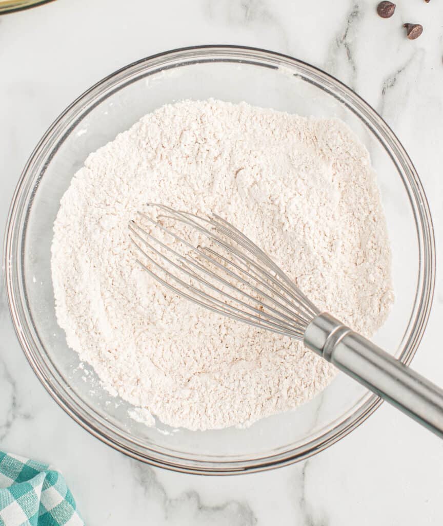whisking the dry ingredients together in a bowl