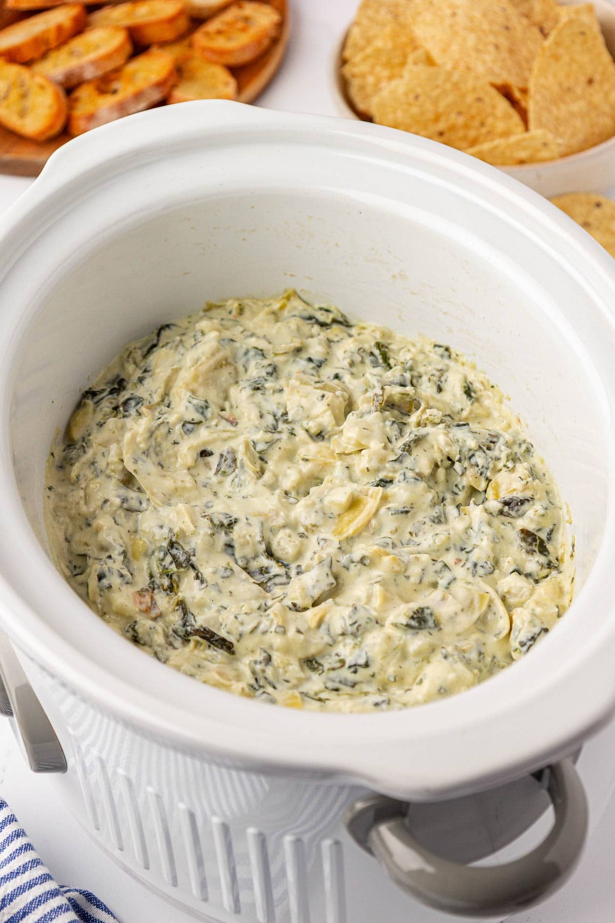 spinach artichoke dip in a slow cooker