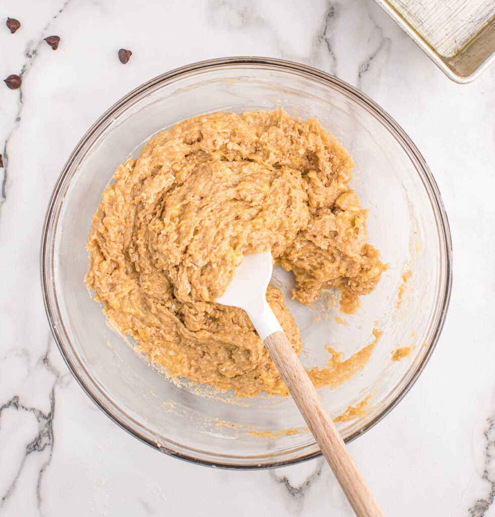 banana bread batter in a mixing owl