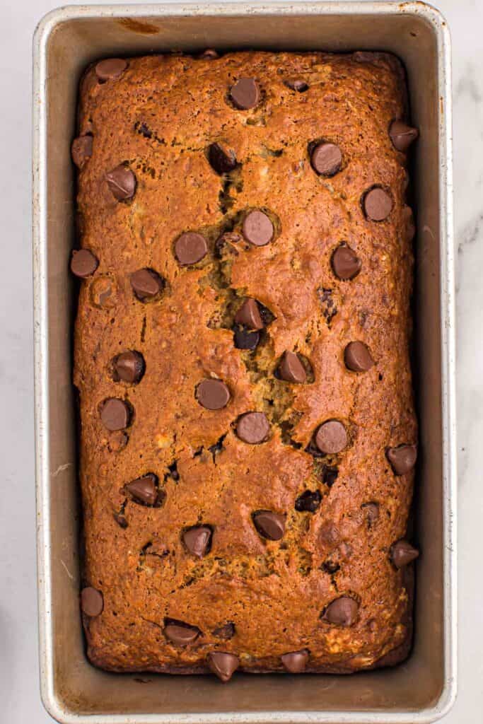 banana bread with chocolate chips in a loaf pan