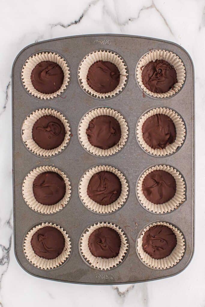 melted chocolate in muffin tin liners