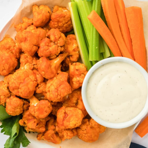 buffalo cauliflower bites with celery, carrots, and ranch