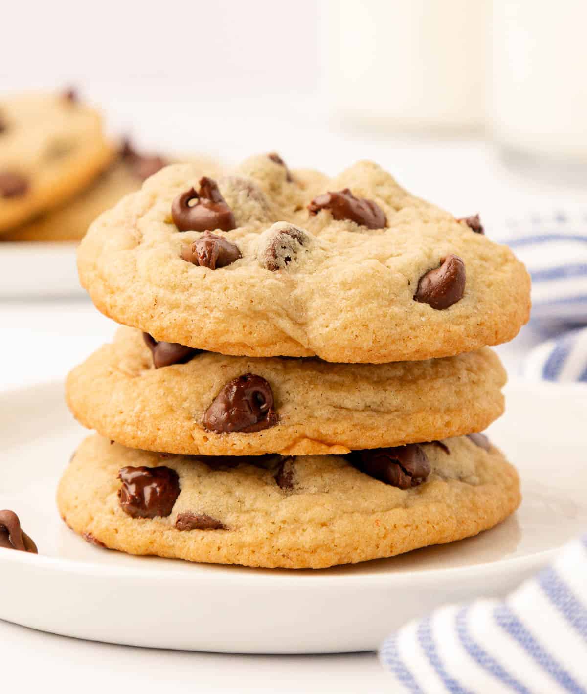 three chocolate chip cookies stacked