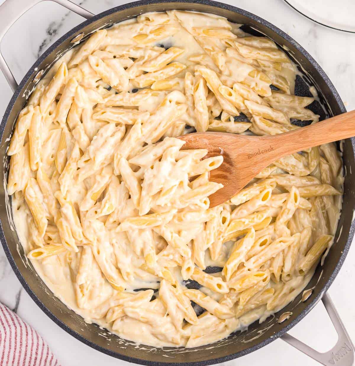 creamy penne pasta in a skillet