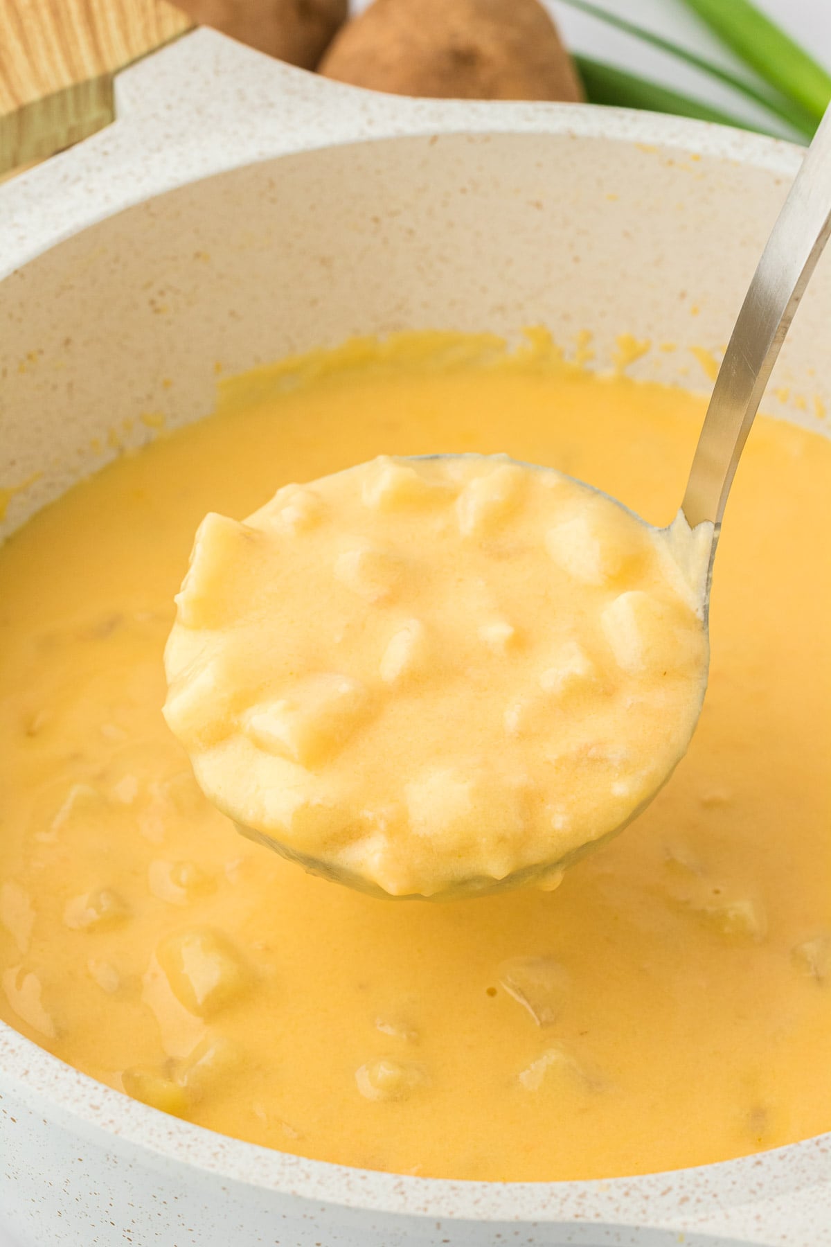 ladle full of potato soup