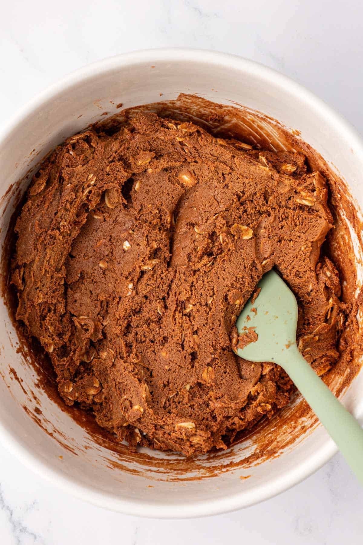 chocolate protein bar batter in a mixing bowl