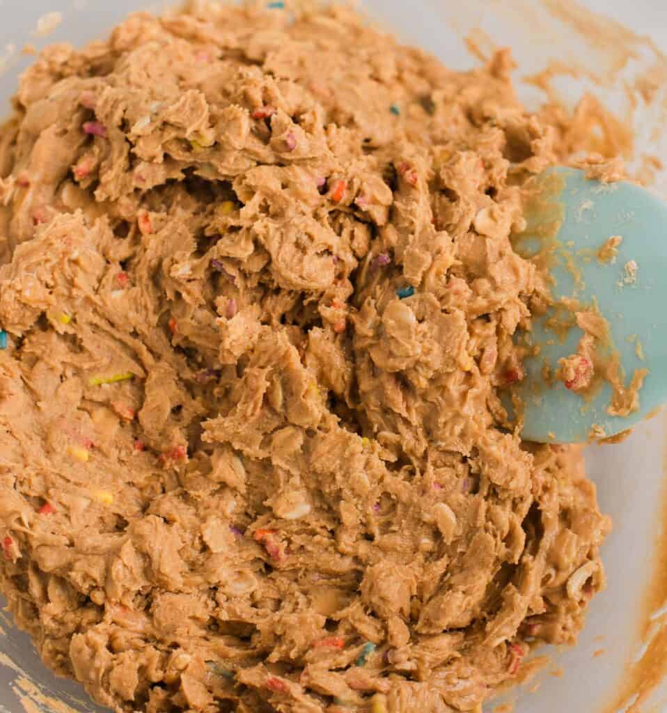 birthday cake protein ball batter in a mixing bowl