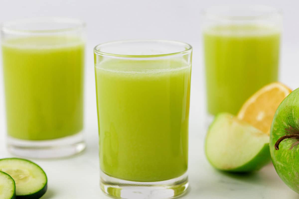 green apple juice in glasses