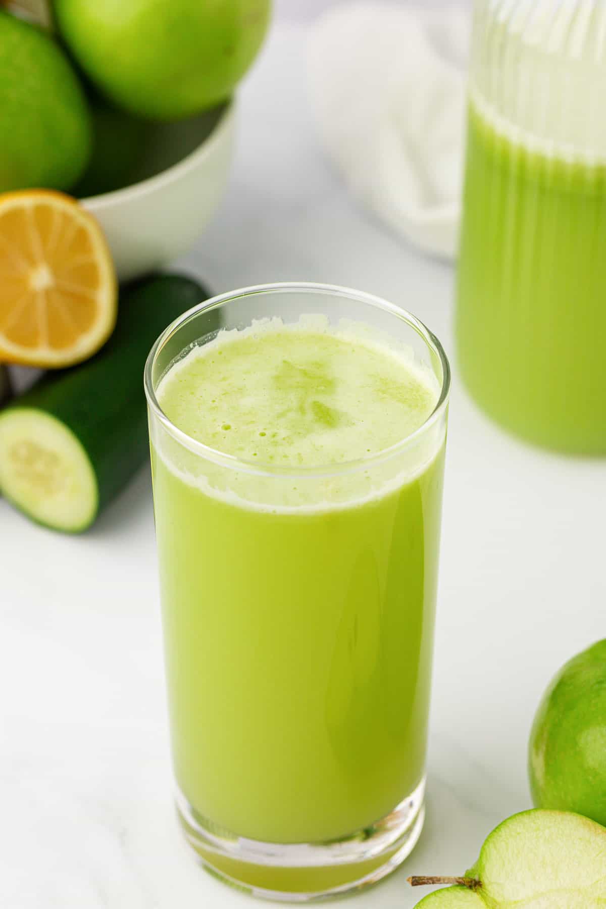 green apple juice in a tall glass