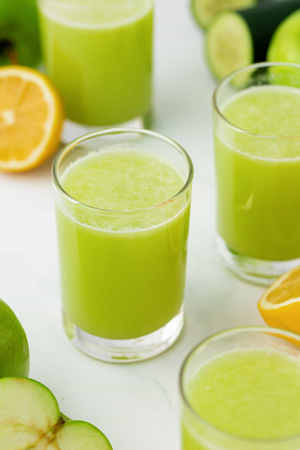 green apple juice in a glass