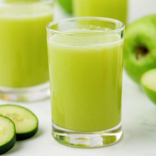green apple juice in a glass