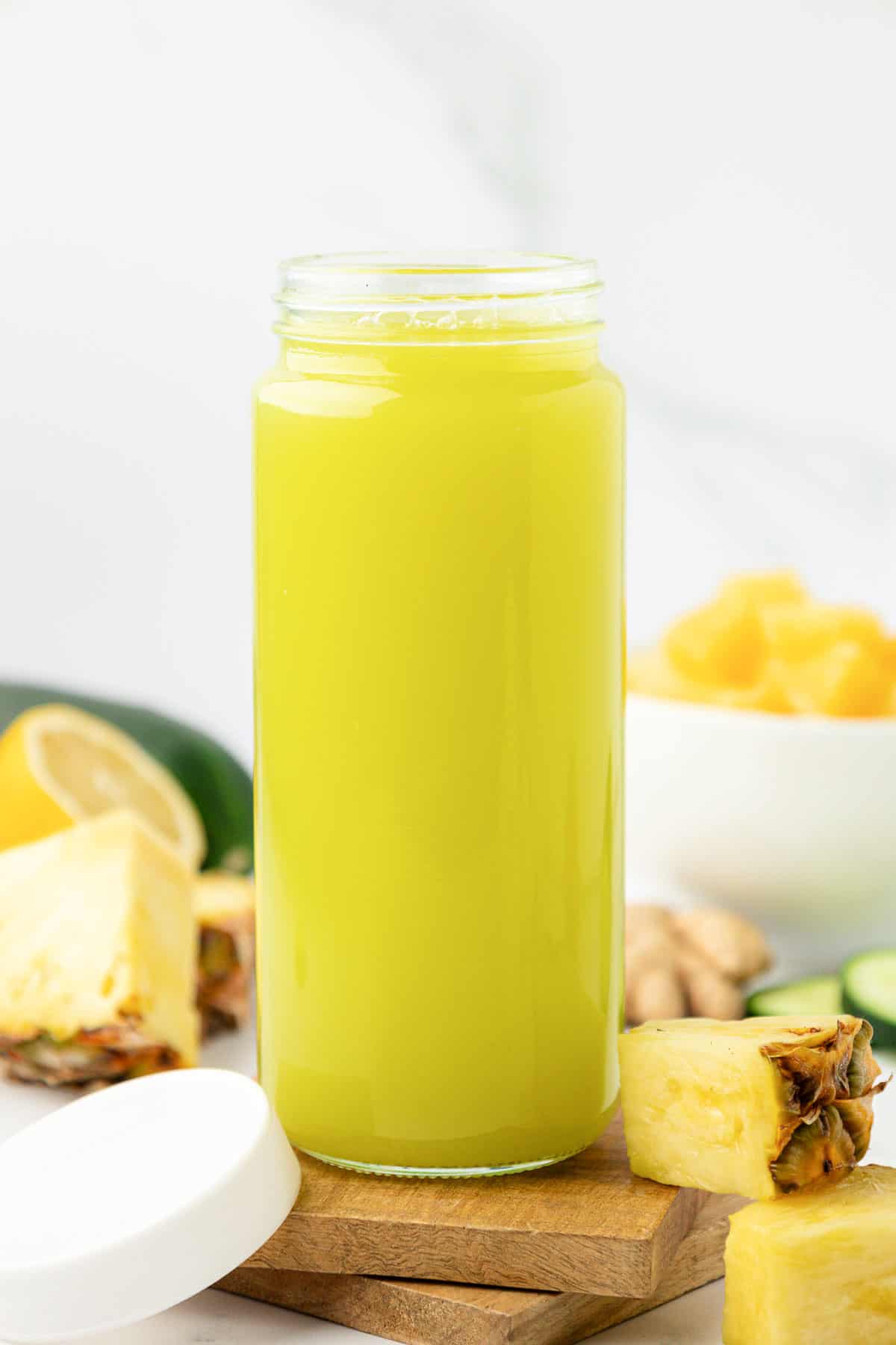 pineapple cucumber juice in a glass with a lid for storage