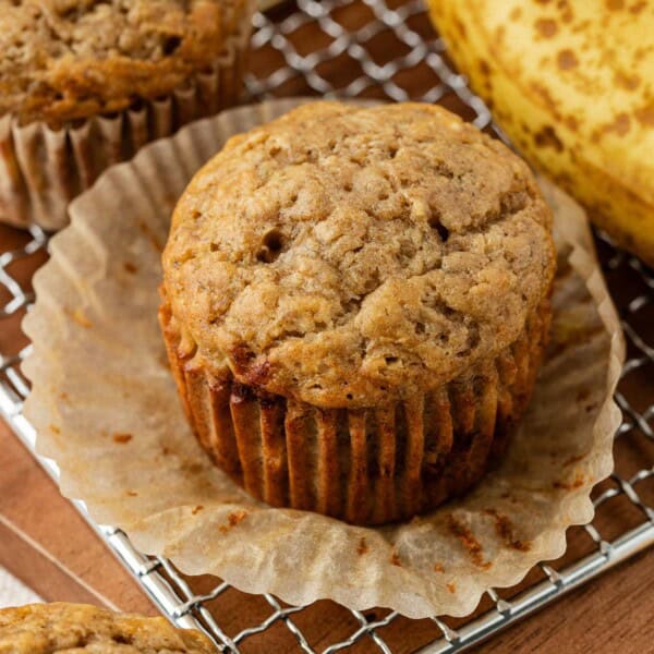 healthy banana muffin on a cooling rack