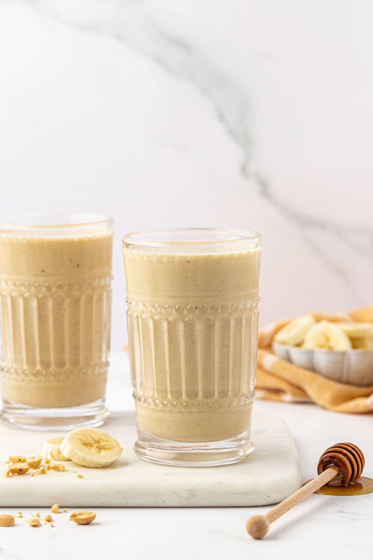 peanut butter banana smoothie in a glass