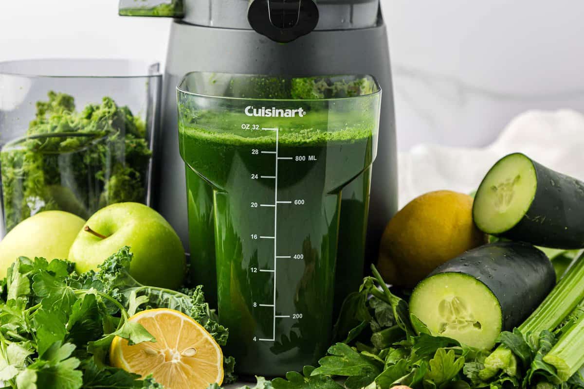 green juice in the juicing canister