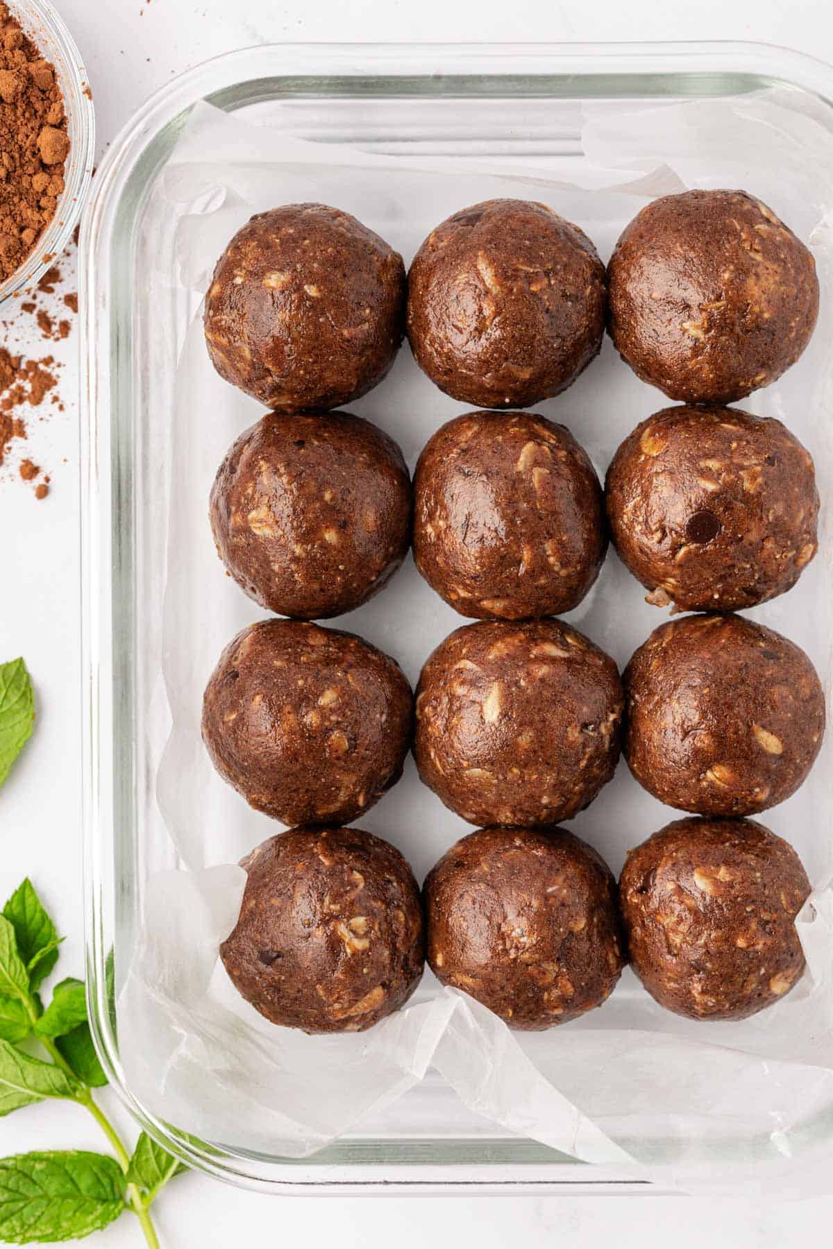 mint chocolate energy bites in a storage container