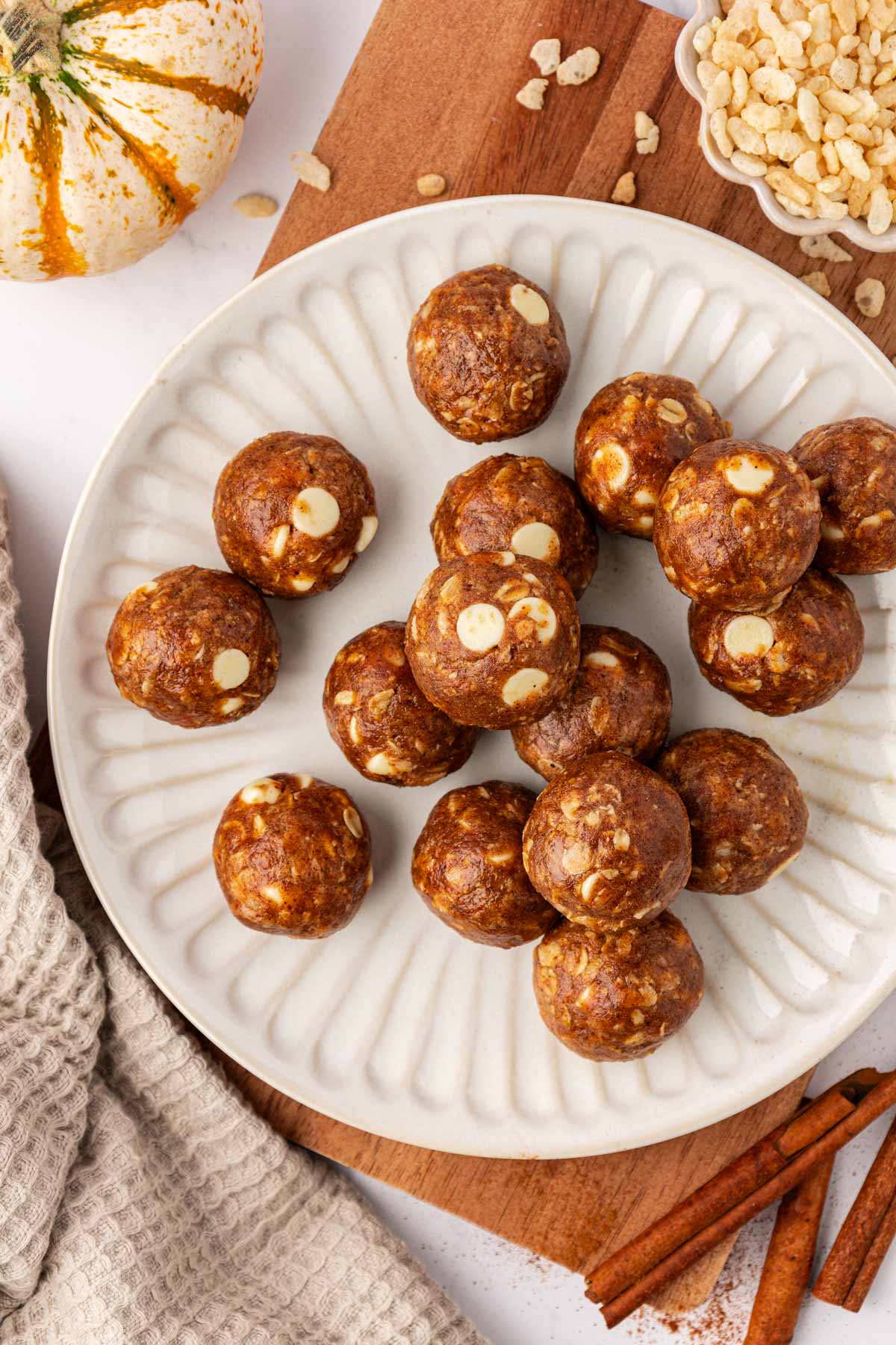 White Chocolate Pumpkin Spice Energy Bites on a white plate