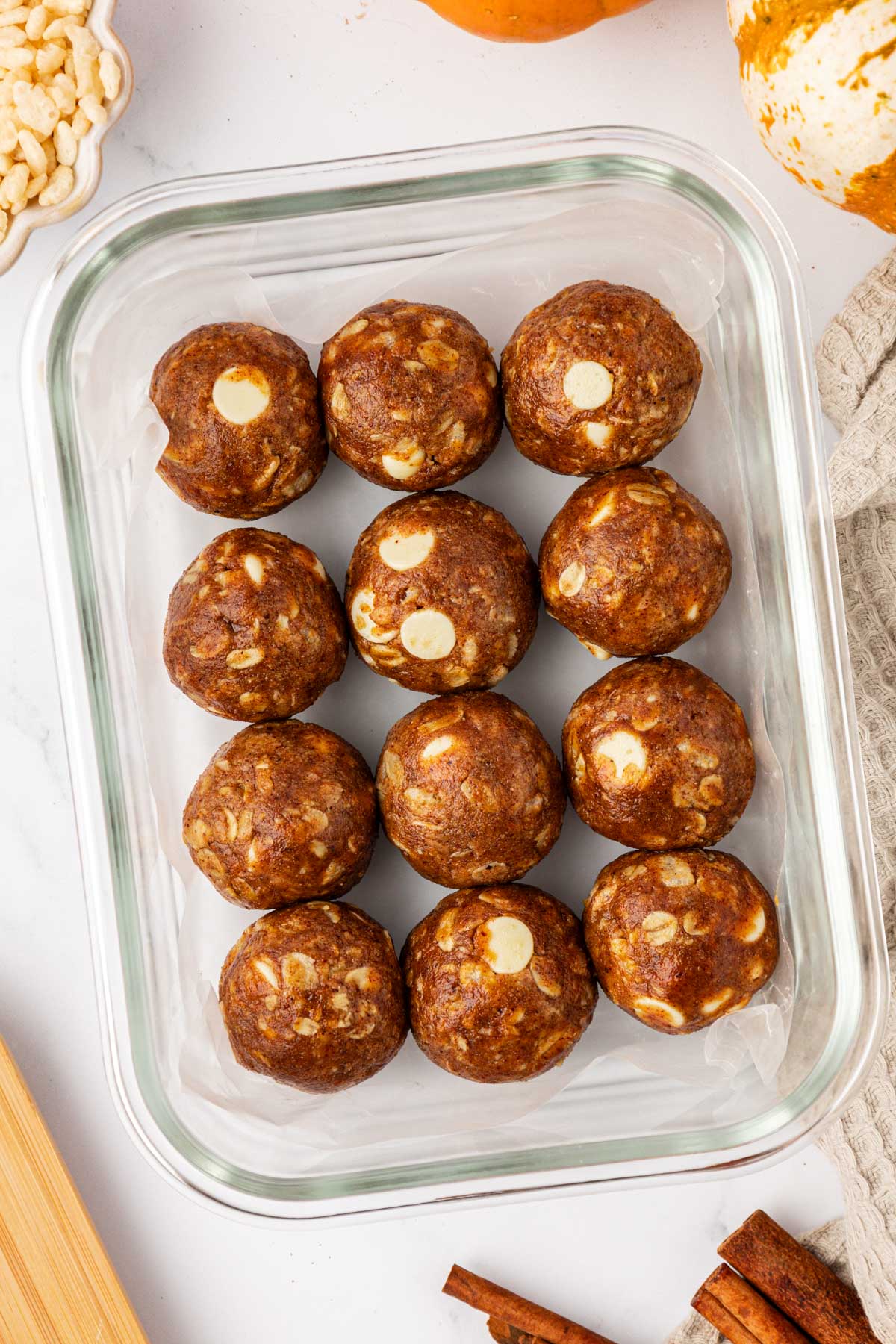 White Chocolate Pumpkin Spice Energy Bites in a storage container