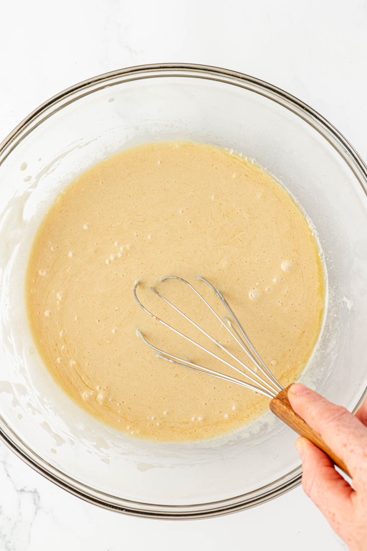 whisking wet ingredients together