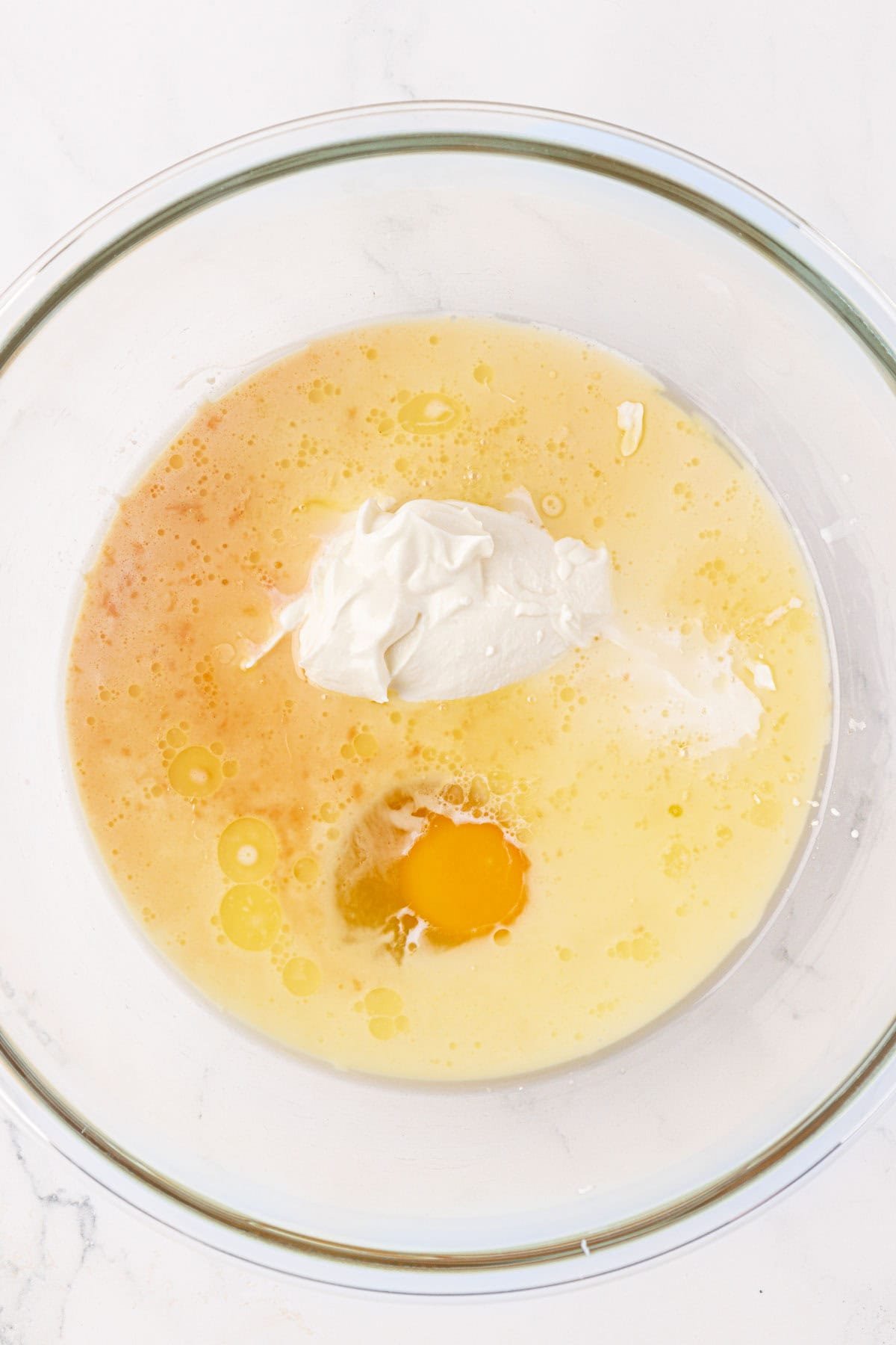 wet ingredients in a mixing bowl