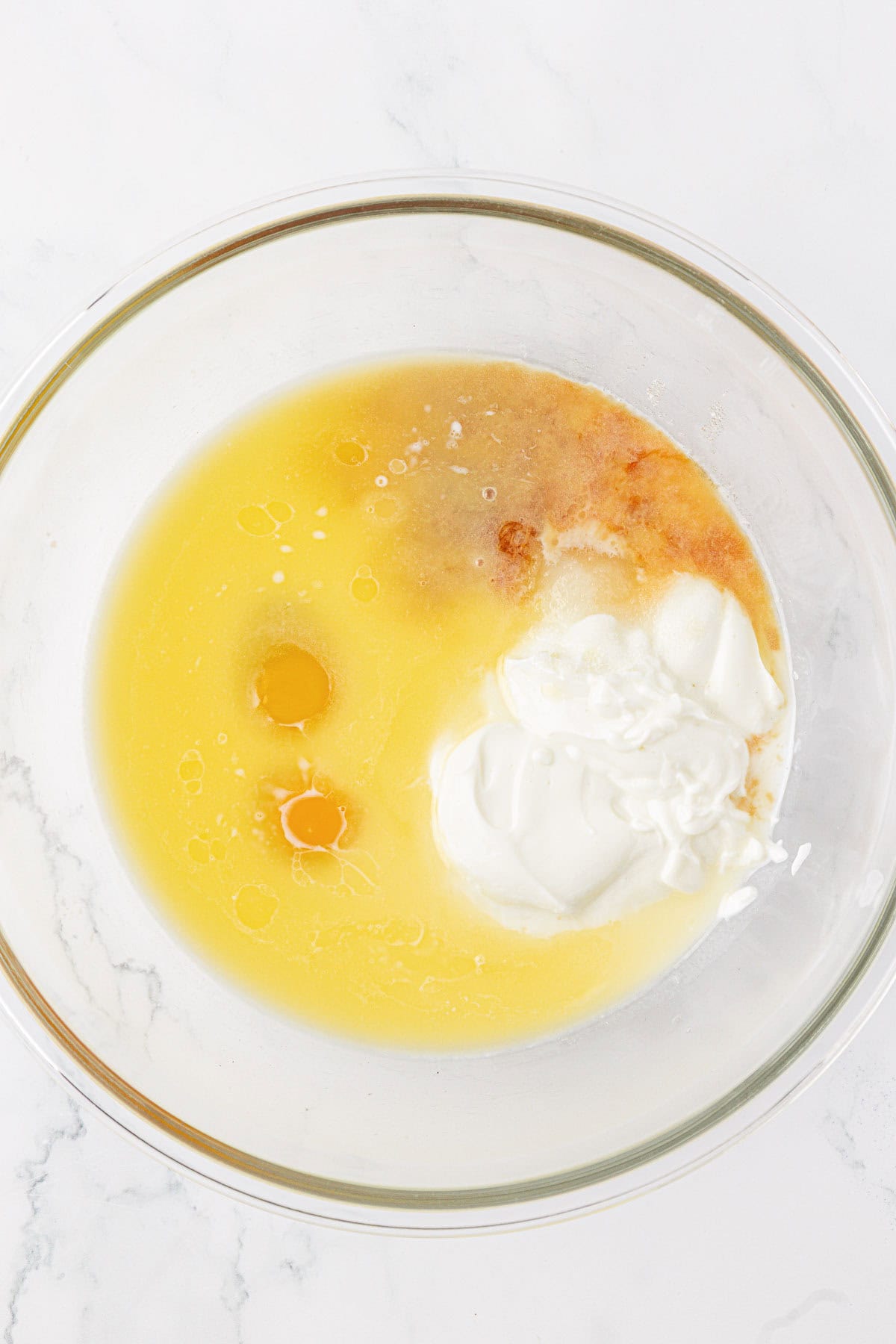 wet ingredients in a mixing bowl