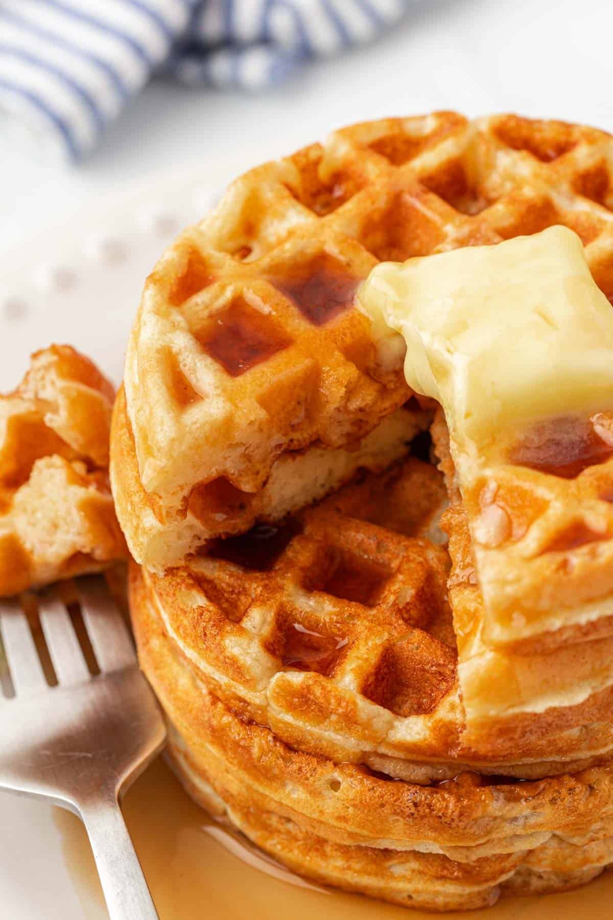 Greek yogurt waffles topped with butter and syrup