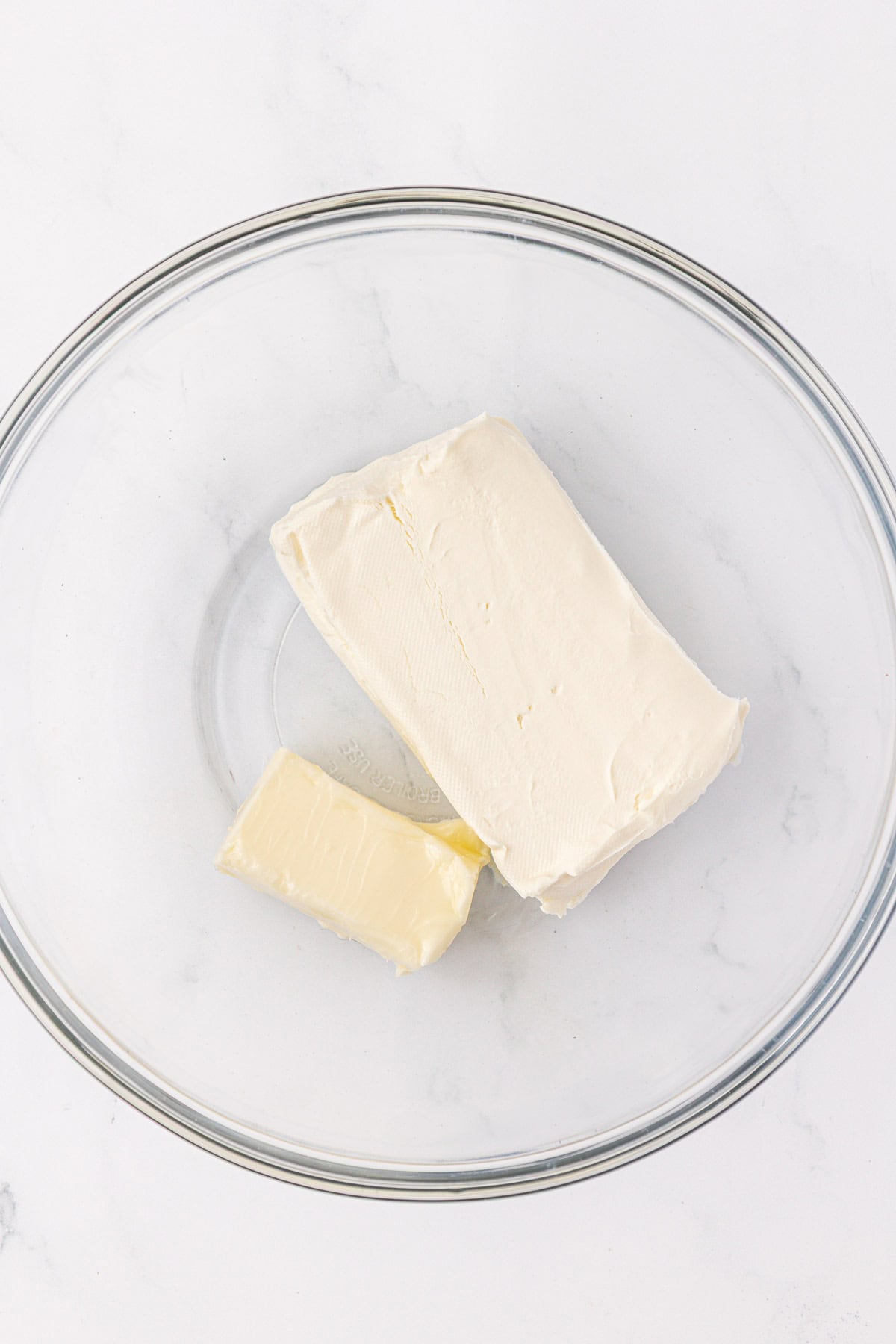 butter and cream cheese in a mixing bowl