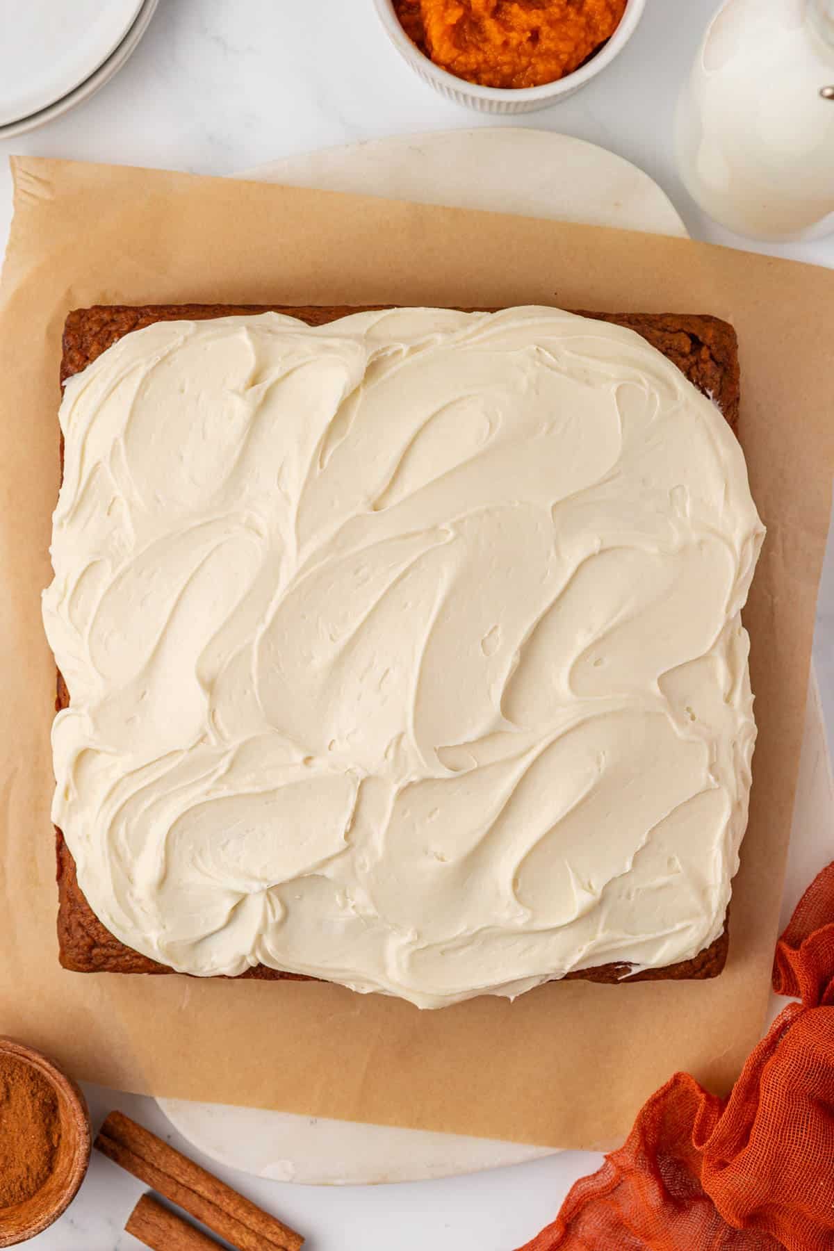 cream cheese frosting on pumpkin cake