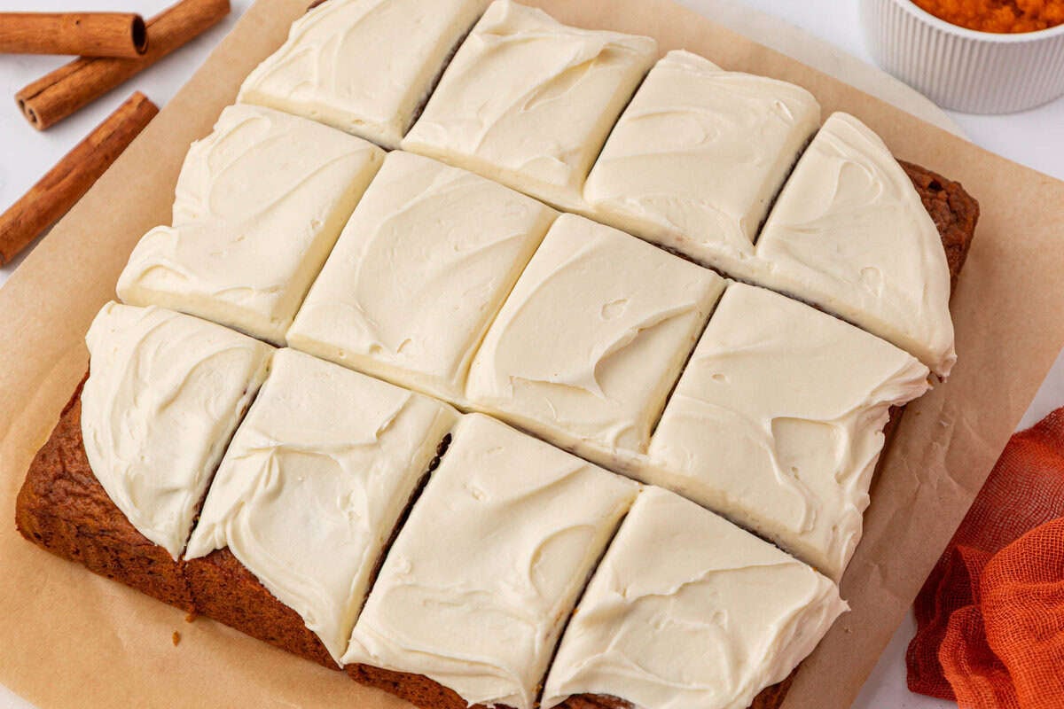 pumpkin snack cake cut into 12 pieces