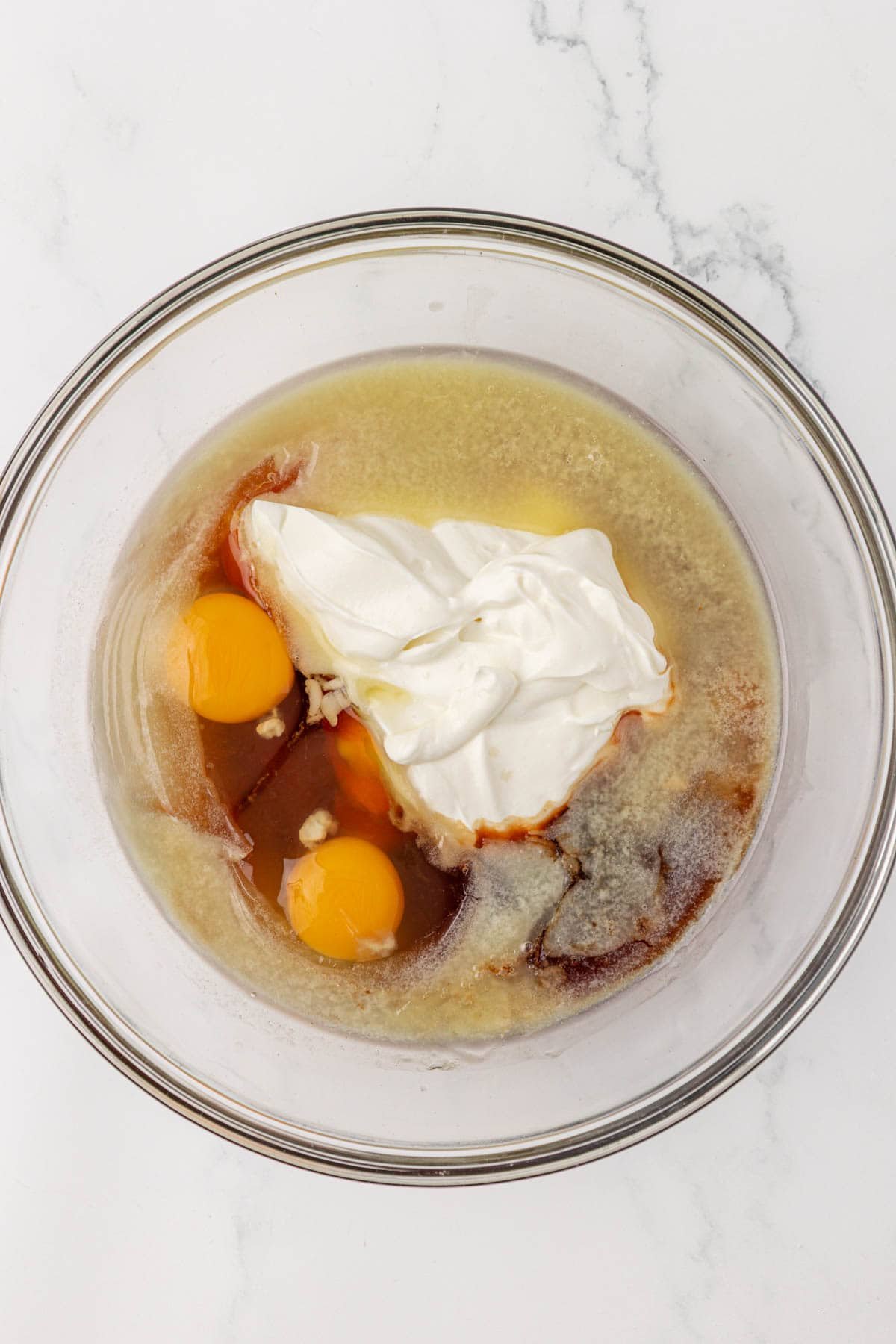 wet ingredients in a mixing bowl