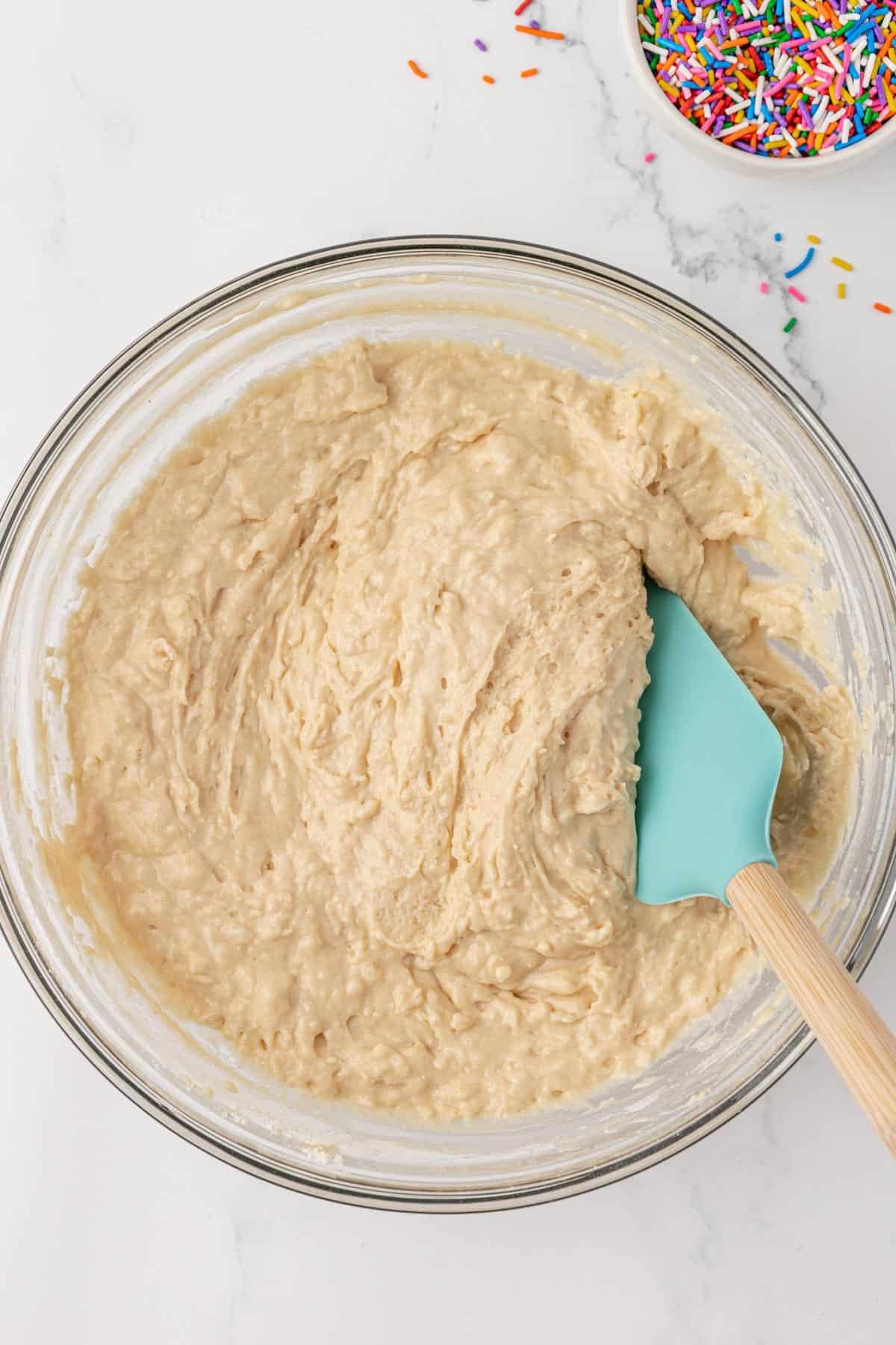 mixing the dry ingredients into the wet ingredients