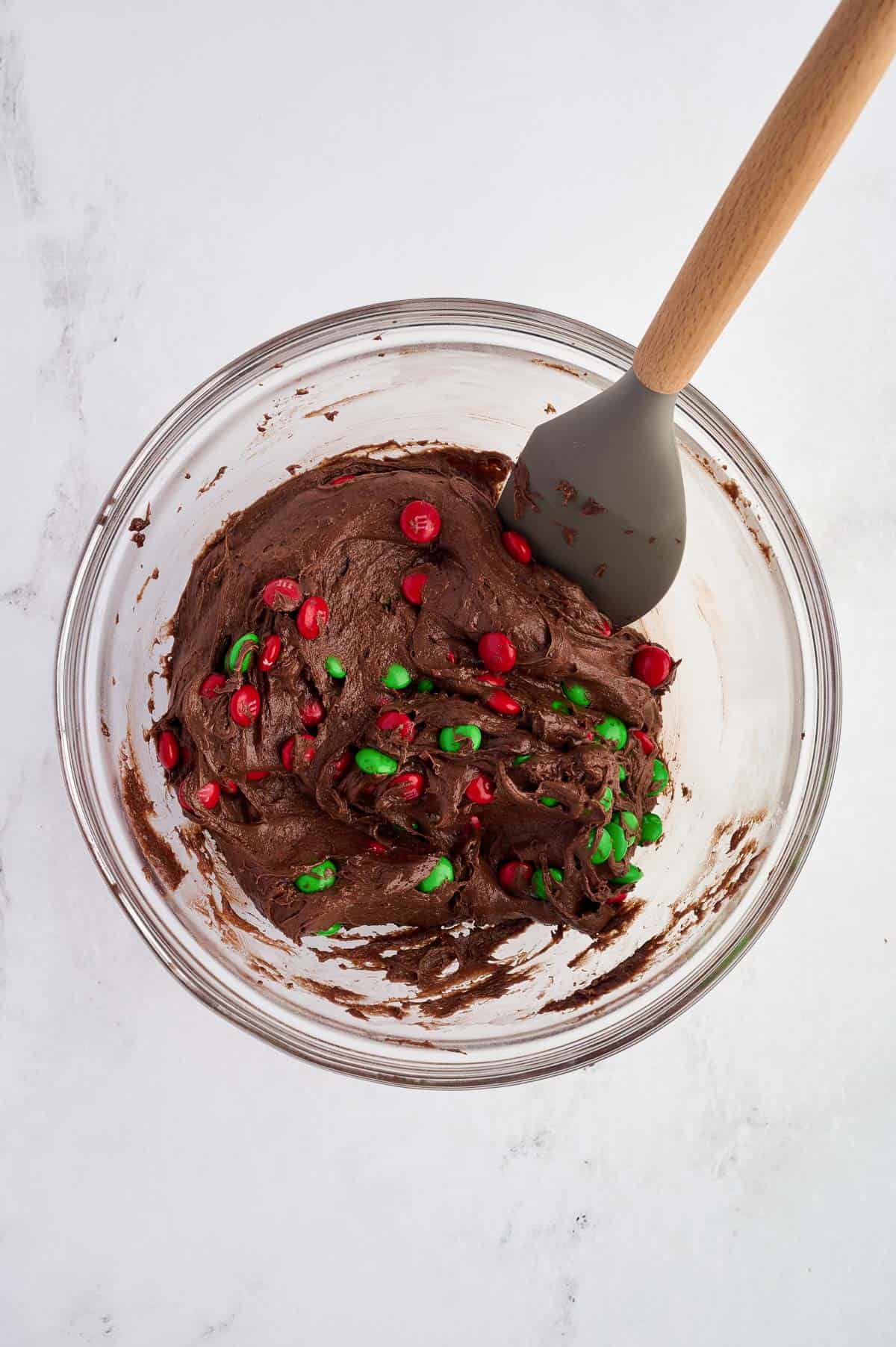 chocolate Christmas cookie batter mixed together in a bowl