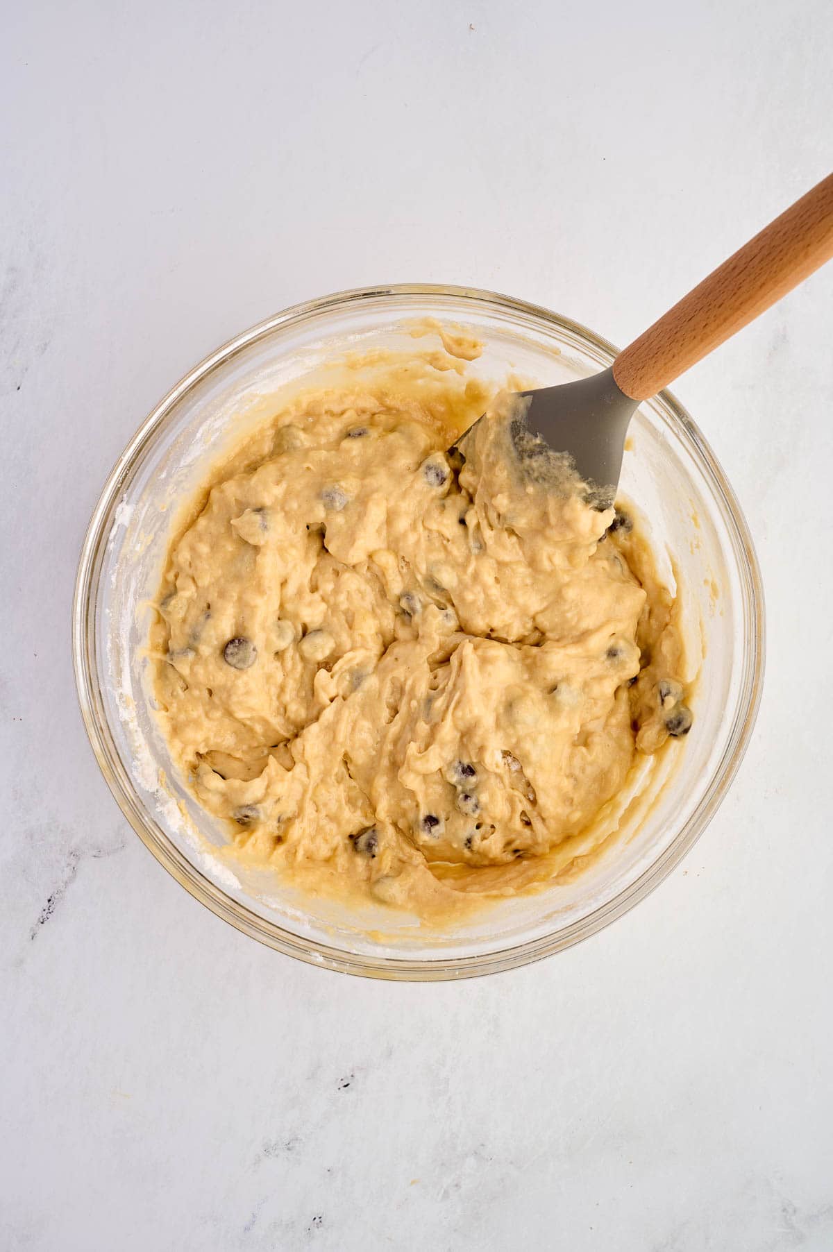 greek yogurt banana muffin batter mixed together