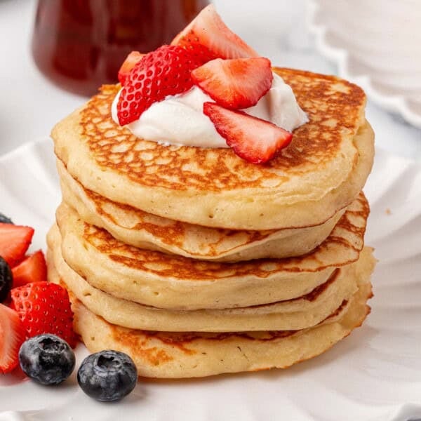 greek yogurt pancakes topped with strawberries