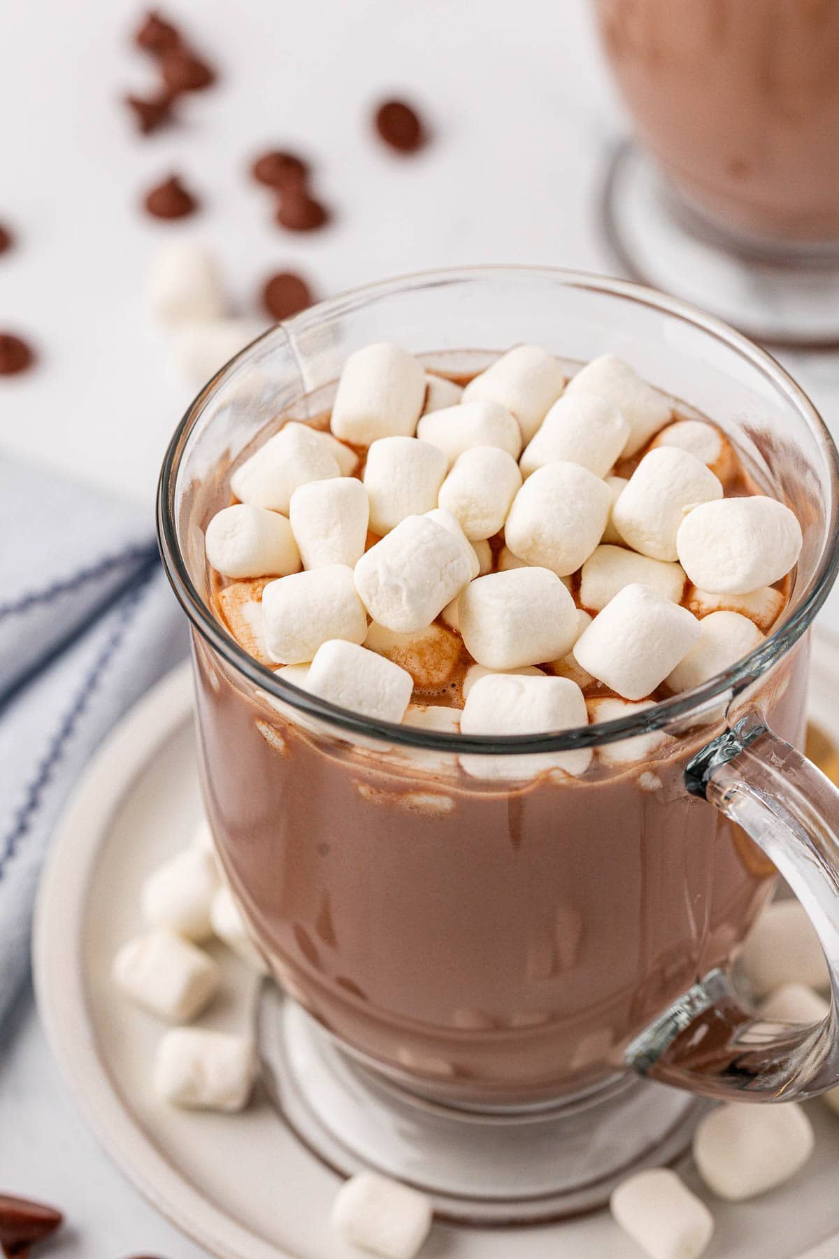 crock pot hot chocolate in a mug with mini marshmallows on top