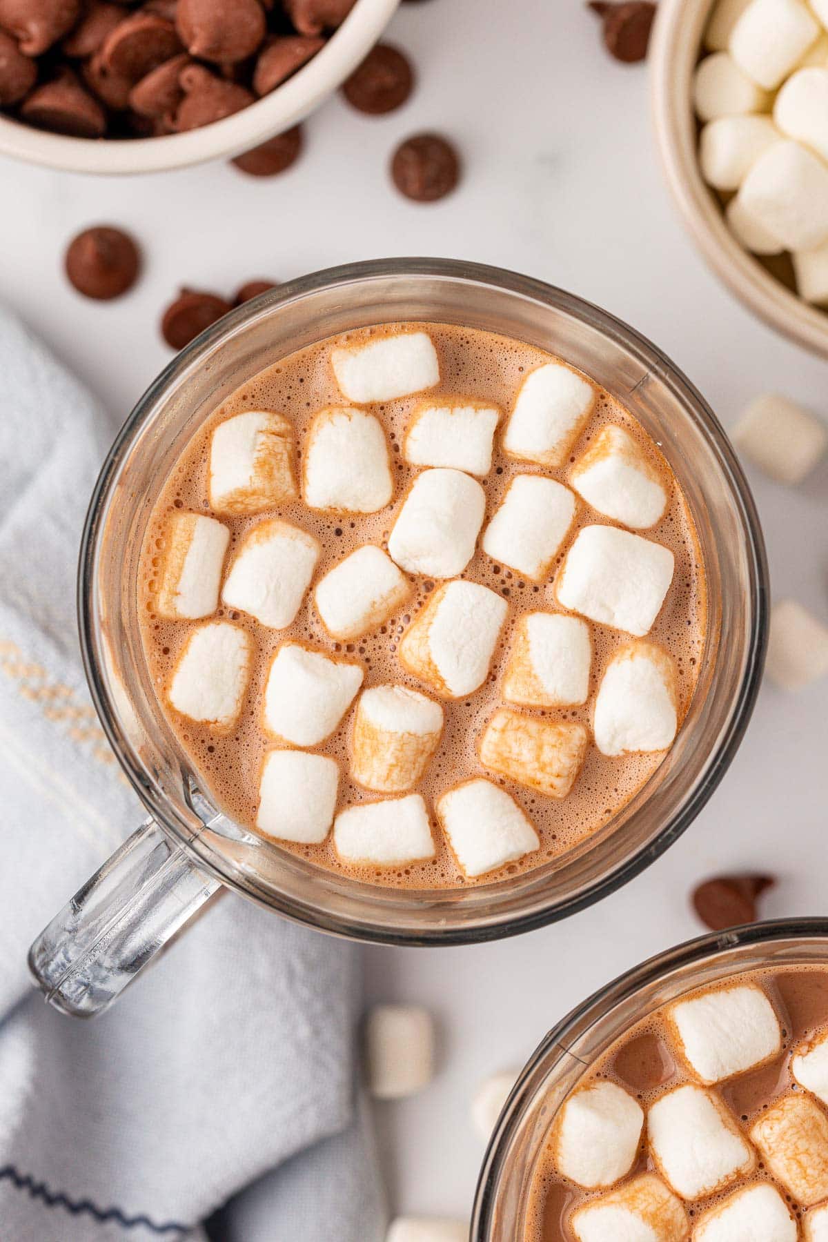 crock pot hot chocolate in a mug with mini marshmallows on top