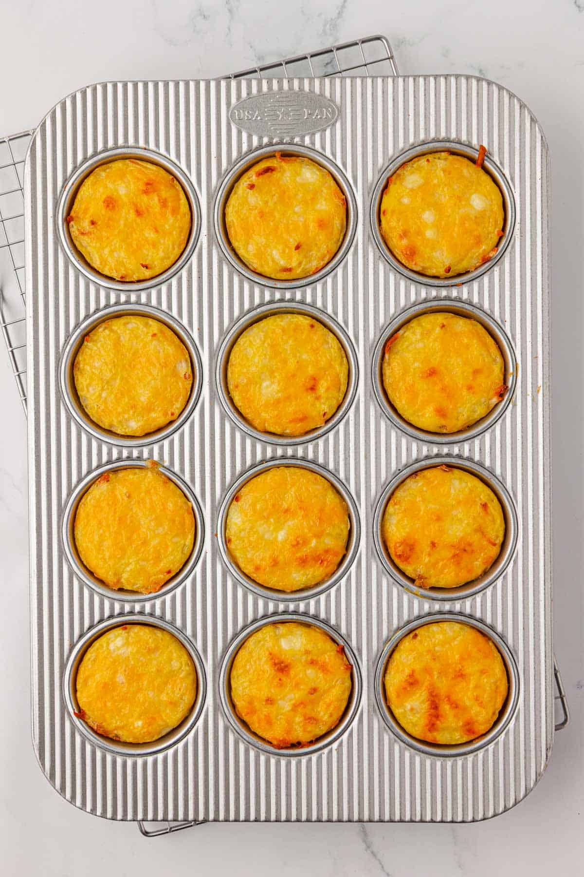 hash brown egg cups in the muffin tin