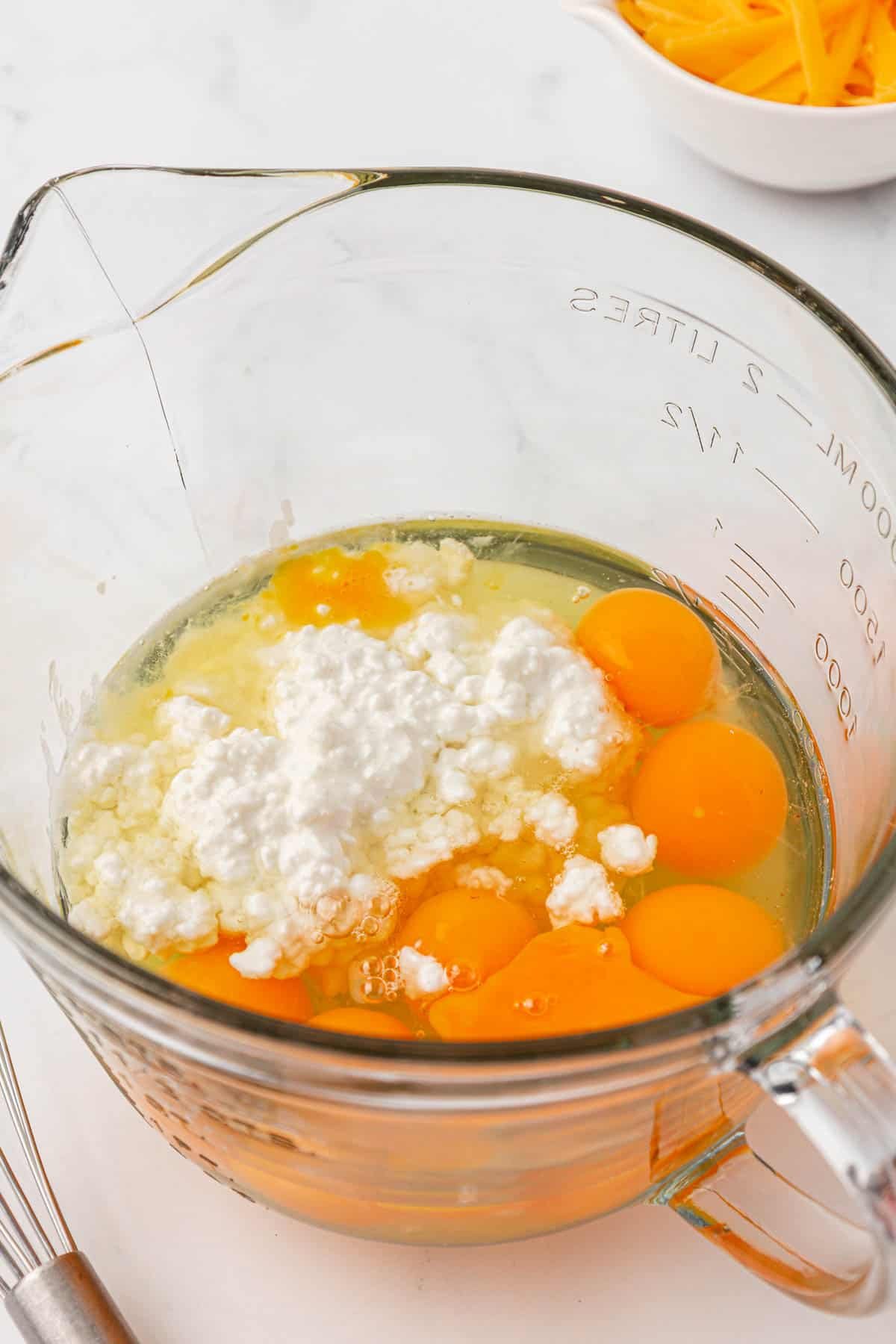 eggs and cottage cheese in a measuring cup