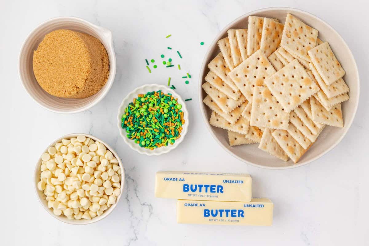brown sugar, white chocolate chips, sprinkles, saltine crackers, and butter