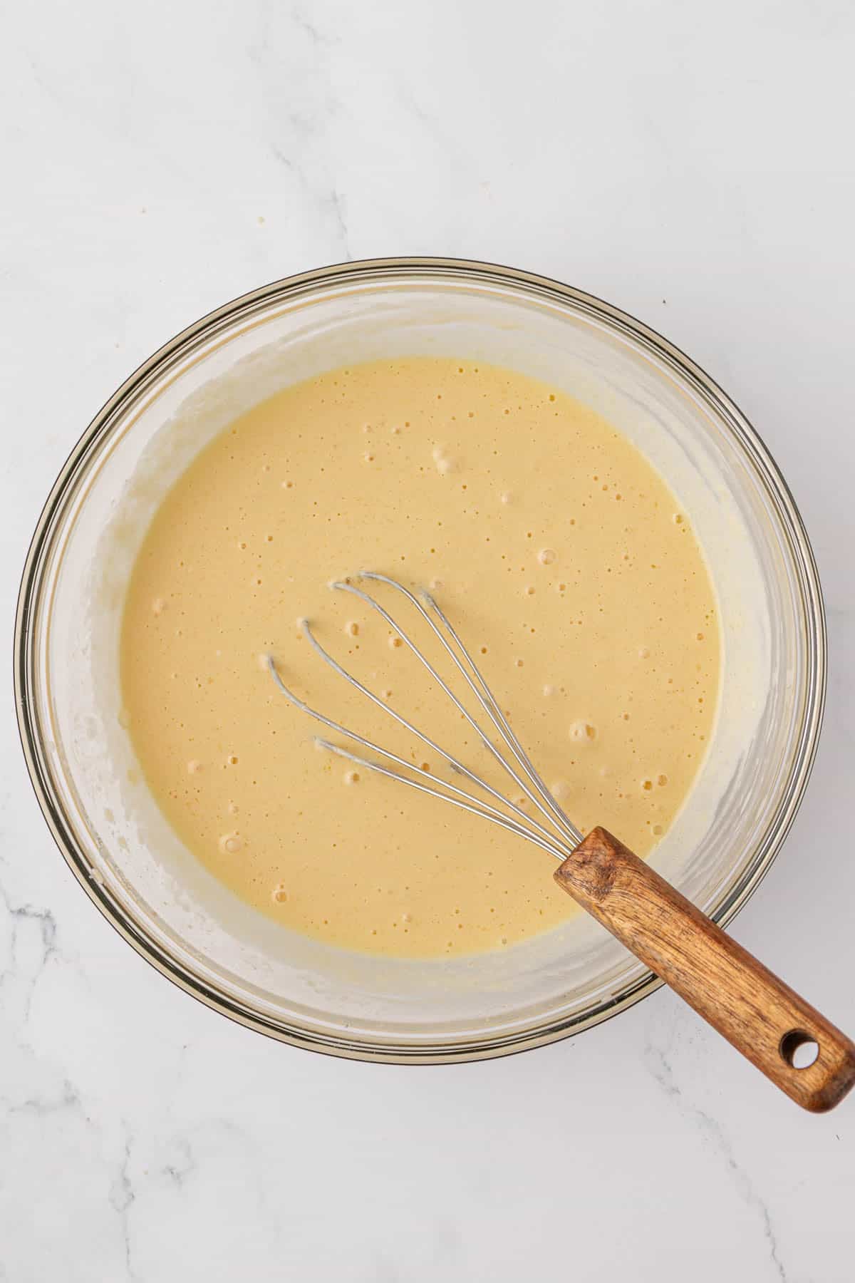 wet ingredients whisked together in a bowl