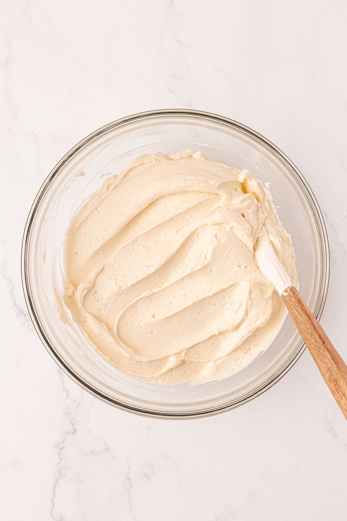no bake cheesecake filling mixed together in a bowl