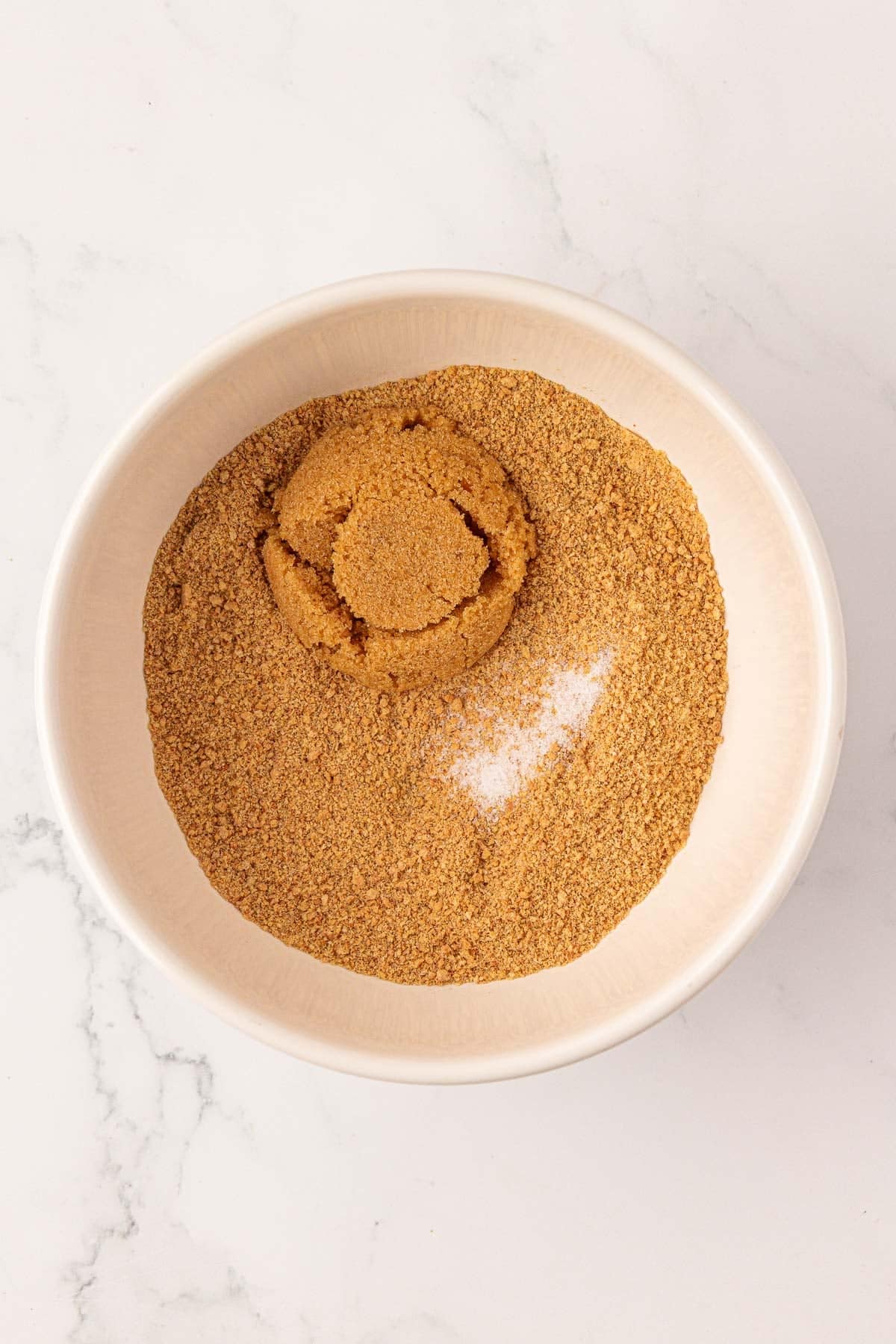 graham cracker crumbs, brown sugar, and salt in a mixing bowl