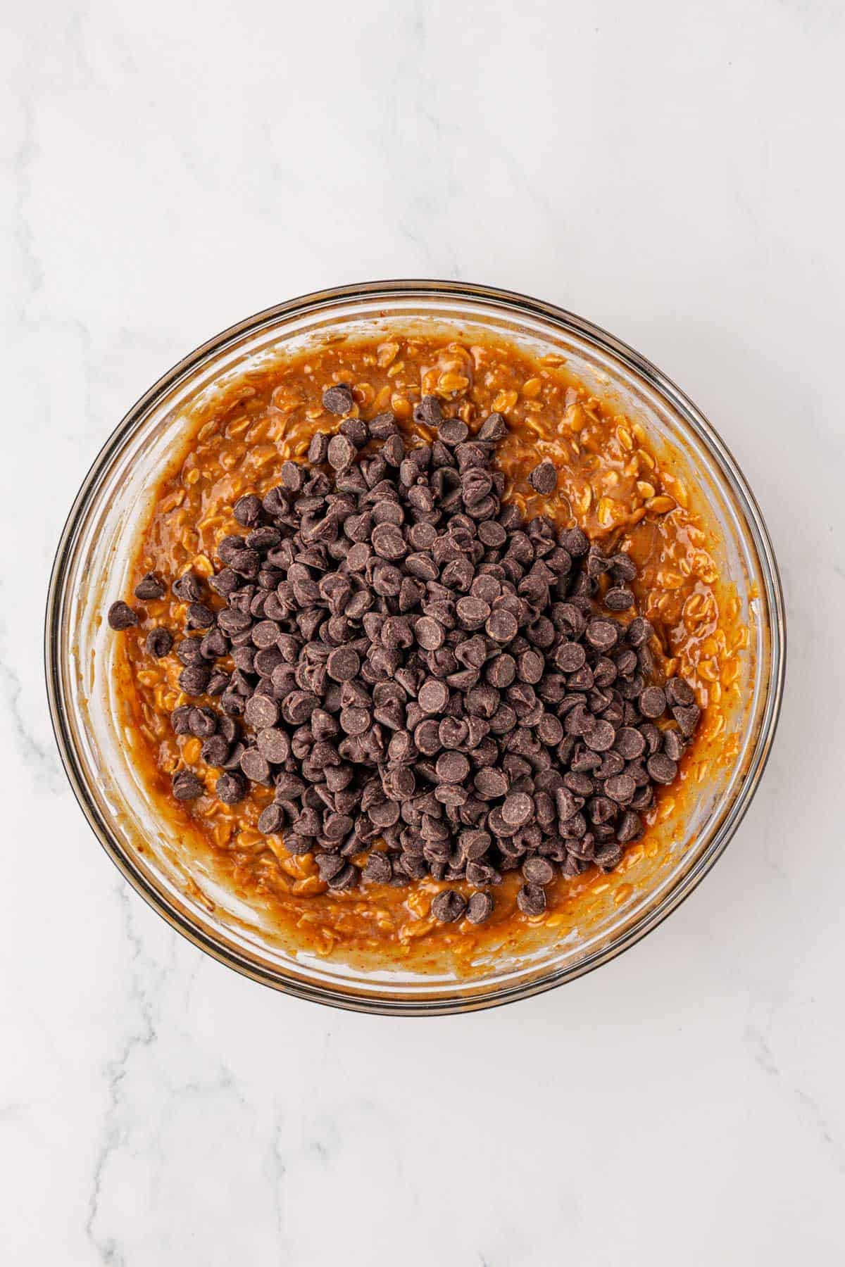 adding the chocolate chips to the batter
