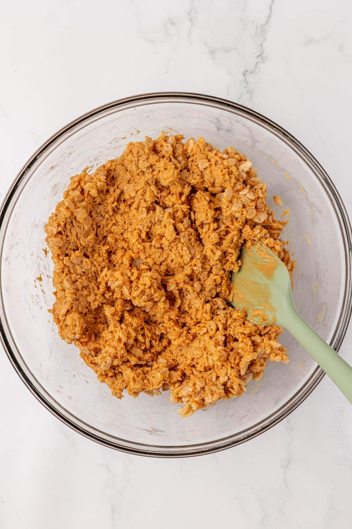 rice krispie peanut butter batter stirred together